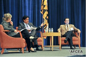 Panelists discussion information technology at the September event are (l-r) Lisa Schlosser, deputy administrator, Office of E-Government and Information Technology, U.S. Office of Management and Budget; Bajinder Paul, deputy associate administrator, Office of Citizen Services and Innovative Technologies, U.S. General Services Administration; and Kenneth Rogers, director, Information Technology Strategic Planning Office, U.S. Department of State.